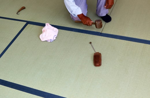 納品